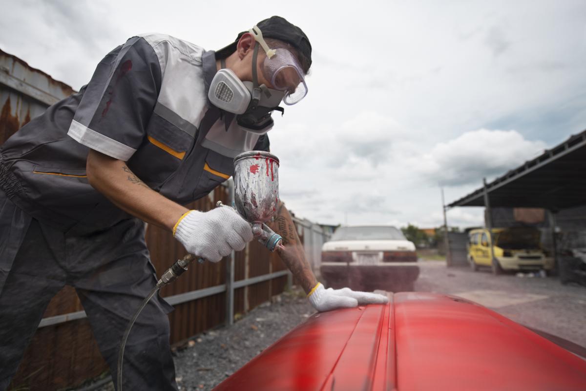 Professional exterior house painting consultation - Univest paint experts providing technical guidance
