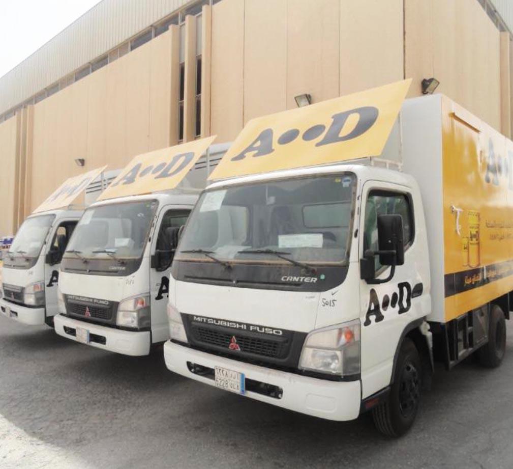 Delivery trucks with company branding